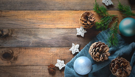 A wooden backdrop, weathered and warm, evokes a sense of nostalgia and tradition. Its natural grain and earthy tones add a touch of rustic charm, providing a comforting contrast to the glittering and vibrant elements that have taken residence upon it.の素材