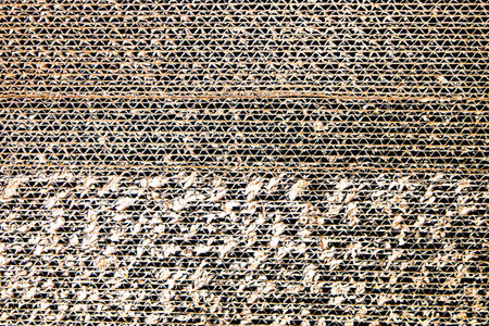 Abstract background of brown cardboard, rough texture, for creative advertising.の写真素材