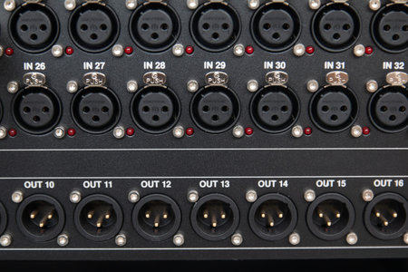 XLR jack connector, the system sends audio signals to the professional digital mixer. The signal cable connection of the microphone preamp to the conference room sound control room.の写真素材