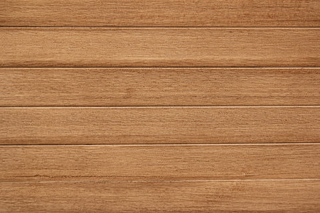 Bright light and wood with interesting patterns and textures.の写真素材