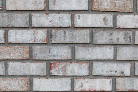 Grey brick wall for use as a background.