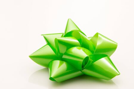 Green giftwrap bow for a present.の写真素材