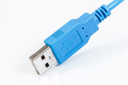 Blue USB cable on a white