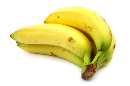 a bunch of fresh bananas on a white background の写真素材