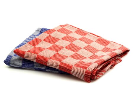 red and blue checkered kitchen towels on a white background の写真素材