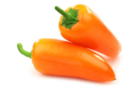 fresh orange peppers  capsicum  on a white background の写真素材