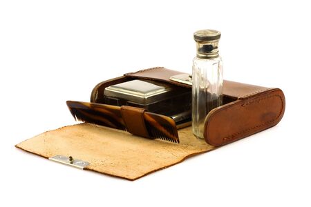 Old leather shaving kit on a white background の写真素材