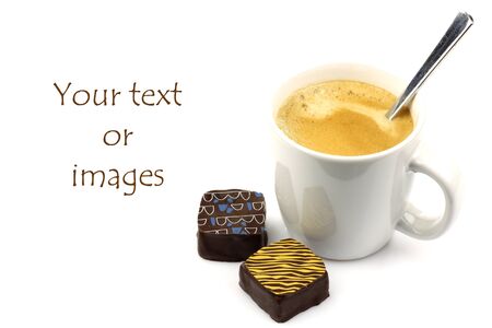 fresh cup of coffee, a spoon and two bonbons with room for tour text or images on a white background の写真素材