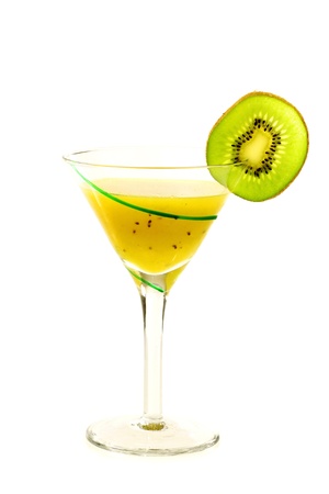 green striped glass of fresh kiwi juice with a slice of kiwi の写真素材