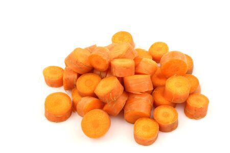 cut fresh carrots on a white background の写真素材