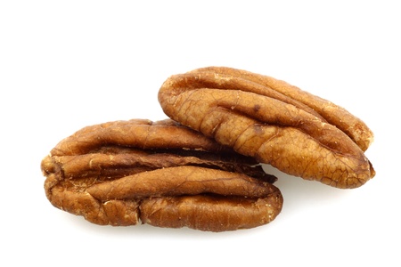 pecan nuts on a white background の写真素材