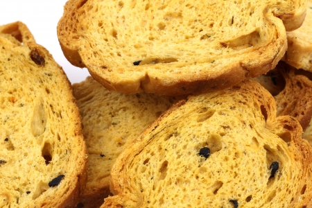 delicious Italian olive and tomato crackers on a white background の写真素材