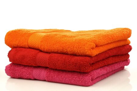 three colorful towels on a white background の写真素材