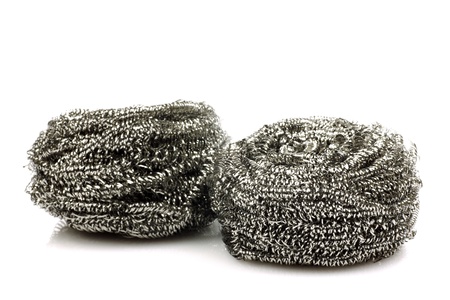 two steel wire scrubs on a white background の写真素材