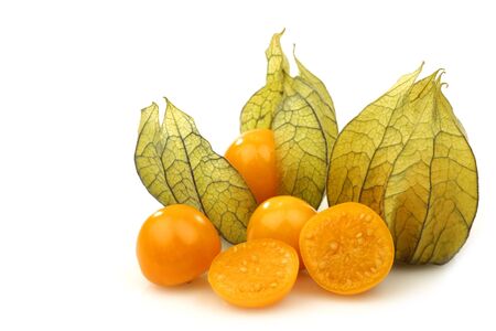 physalis fruit  Physalis peruviana  and some cut ones on a white background の写真素材