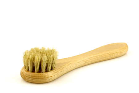 wooden shoe polishing brush on a white background 