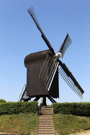 wooden windmill near the old fortress of Bourtange in the Netherlands の写真素材