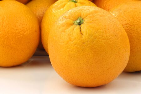  fresh oranges on a white background の写真素材