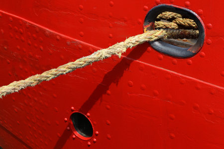nylon rope ties a ship to the quayside 