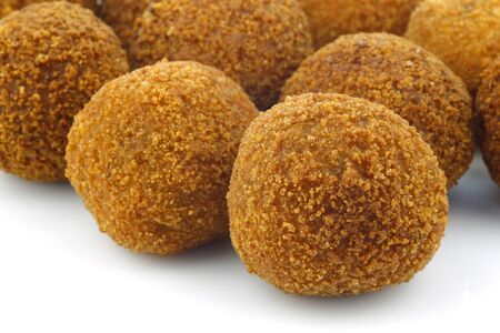 A real traditional Dutch snack called  bitterballen  on a white background の写真素材
