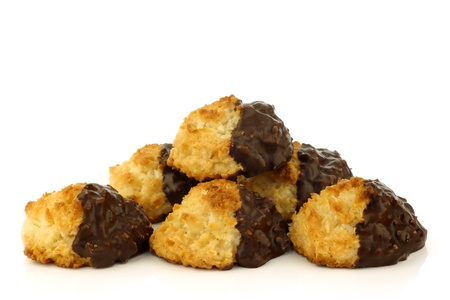 freshly baked cocos and chocolate cookies on a white background の写真素材