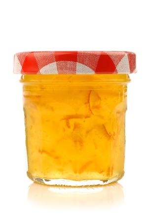 glass jar with marmalade with room for your label, texr or images on a white background の写真素材