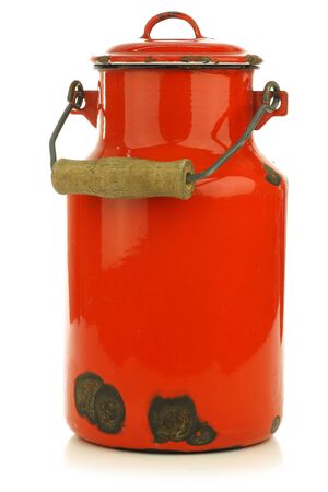 vintage red enamel milk can on a white background の写真素材