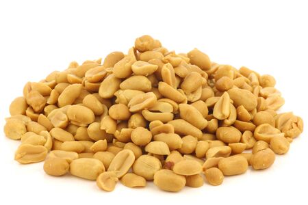 tasty peanuts on a white background の写真素材