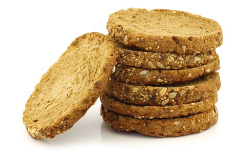 stacked Dutch traditional  Waldkorn  wholemeal rusks on a white background の写真素材