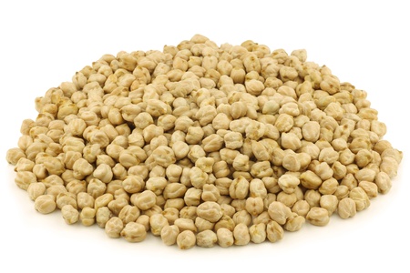 dried chick peas on a white backgroundの写真素材