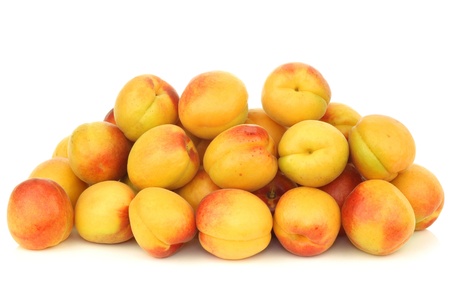 fresh colorful apricots on a white backgroundの写真素材