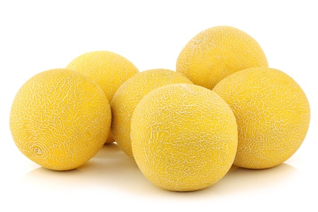 fresh galia melons on a white backgroundの写真素材