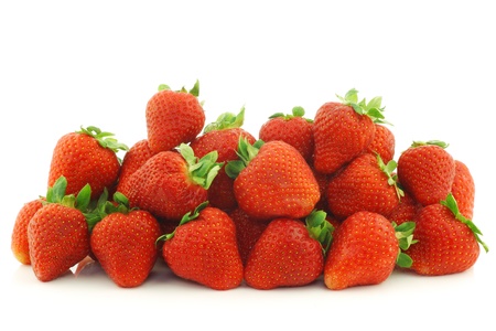 bunch of fresh strawberries on a white backgroundの写真素材