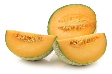 cut fresh cantaloupe melon on a white backgroundの写真素材