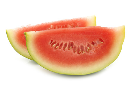 fresh watermelon pieces on a white backgroundの写真素材