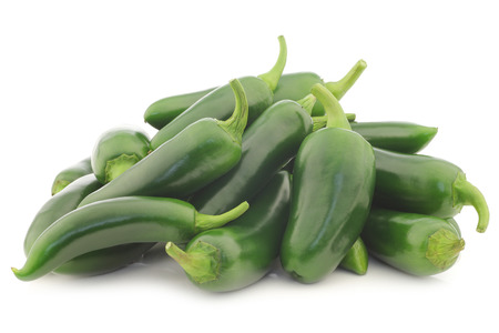 Bunch of fresh green peppers  capsicum  on a white backgroundの写真素材