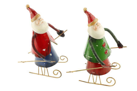 Old vintage metal Santa Claus figures on a sleigh usable for christmas greeting cardsの写真素材