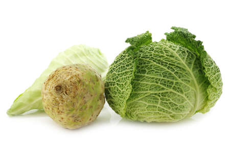 green cabbage, celery and a pointed cabbage on a white backgroundの写真素材