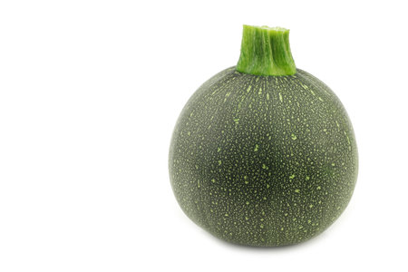 fresh round zucchini on a white backgroundの写真素材