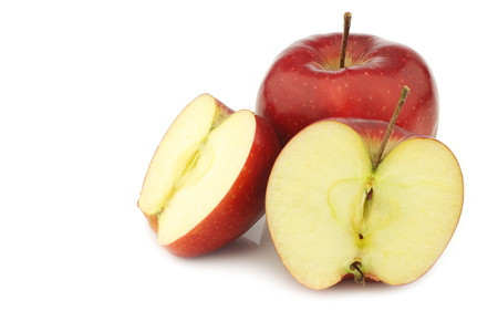 Jonagold apple and two halves on a white backgroundの写真素材