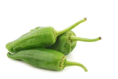 bunch of fresh green jalapeno peppers on a white backgroundの写真素材