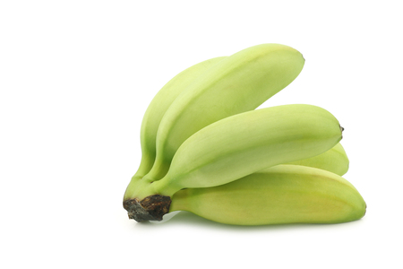 a bunch of small snack bananas on a white backgroundの写真素材