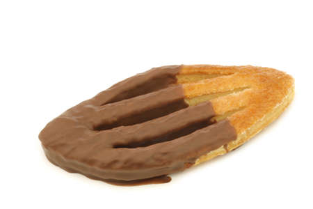 traditional dutch cookies called "pretzel" with a chocolate cover on a white backgroundの写真素材