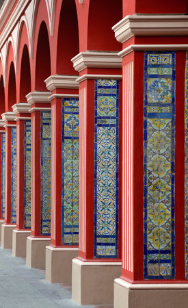 Red Arch Columns Pathway with Classic Colorful tiles - Lima Peru