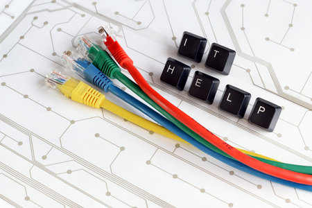 IT HELP, Assistance - HELP made of keyboard keys with colourful network cables on white circuit...