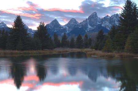 Sunset reflection at Schwabachers Landing, Grand Teton National Park, Wyomingの写真素材