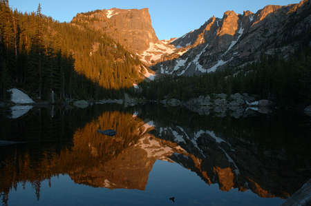 Sunrise reflection at Dream Lake, Rocky Mountain National Park, Coloradoの写真素材