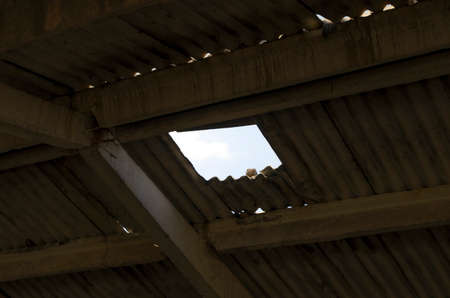 Roof of the old house. View from the bottom to the sky.の写真素材
