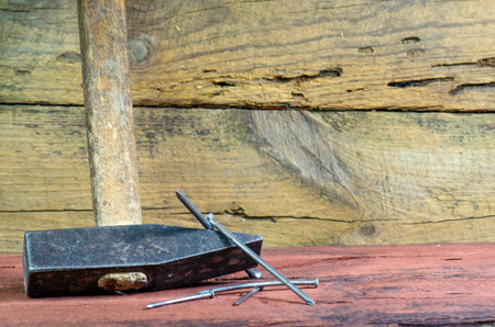 Hammer with nails. Close-up tool