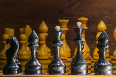Chess pieces on a chessboard, close-up, selective focusの写真素材